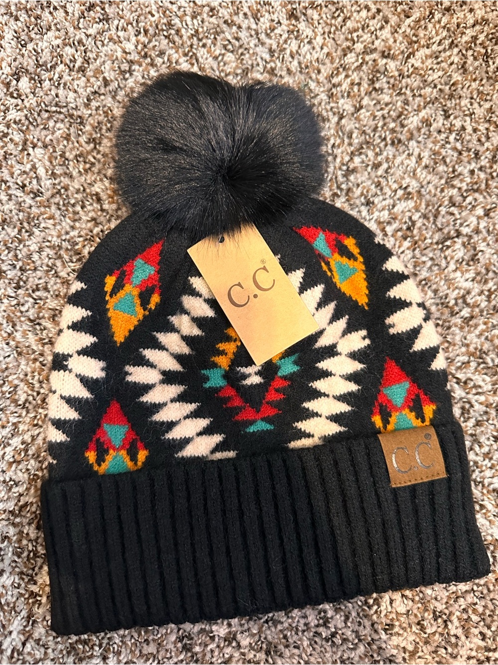 C.C Kids Black Aztec Pom Beanie with Red, Teal & Yellow Accents
